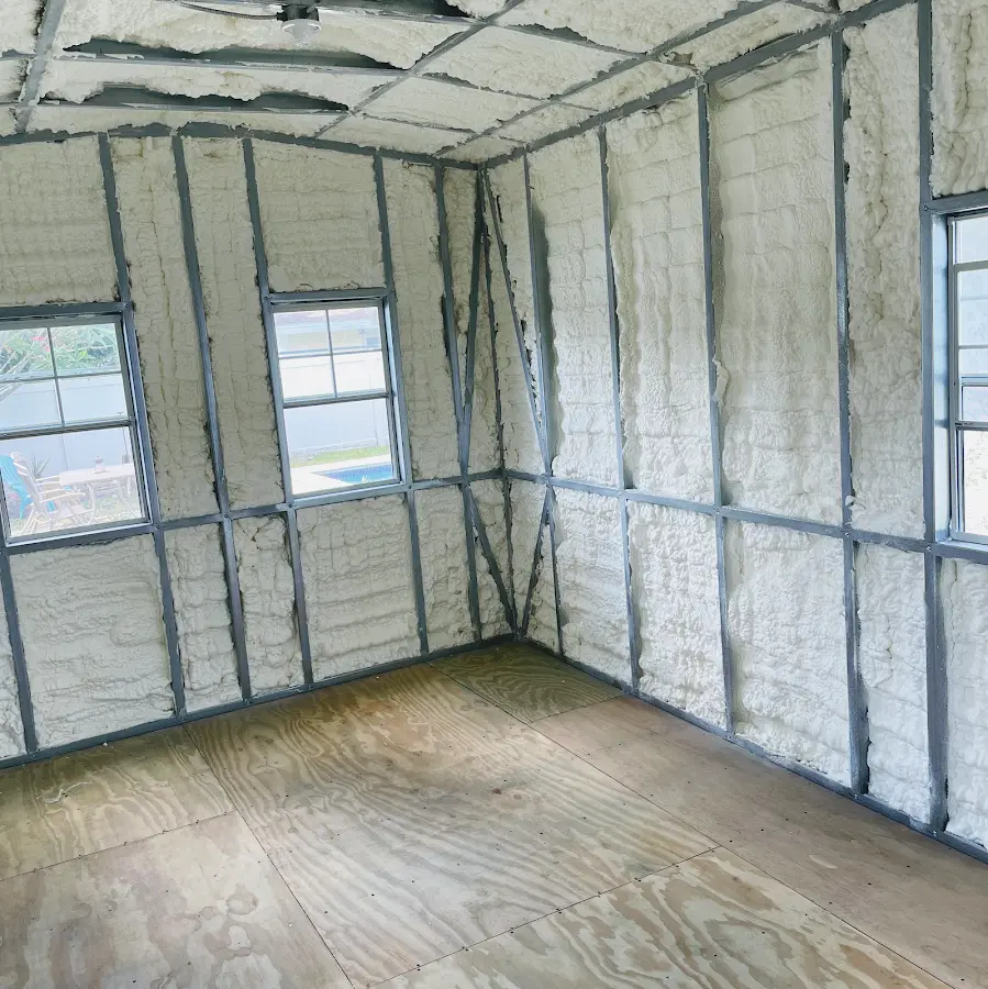 Closed-cell spray foam insulation applied to wall cavities in a residential project in Jerseyville