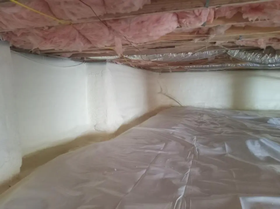 Crawl space encapsulation with closed-cell spray foam for Commercial Roof Restoration in Jerseyville